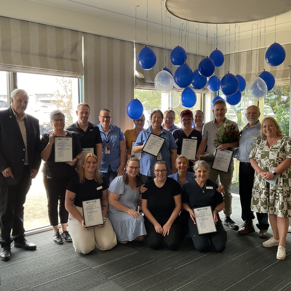 group photo of the award winners, and nominees. 